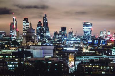 Illuminated cityscape at night