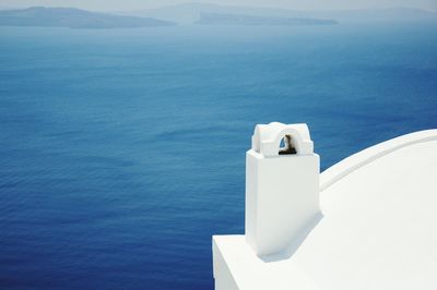 High angle view of sea against blue sky