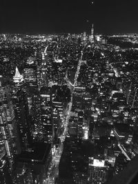 High angle view of illuminated cityscape at night