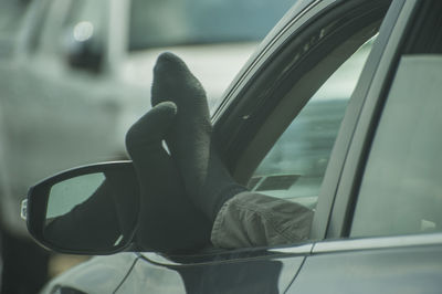 Low section of man in car