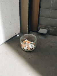High angle view of cigarette in container