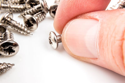 Close-up of hand on table