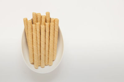 Close-up of cake against white background