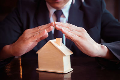 Close-up of man holding hands