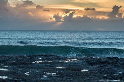 Scenic view of sea against sky during sunset