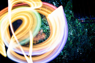 Digital composite image of light painting at night