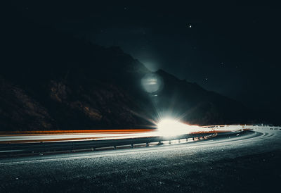 Light trails on road at night