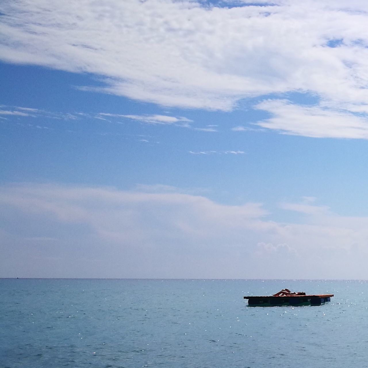 sky, sea, water, nautical vessel, cloud - sky, horizon over water, horizon, transportation, mode of transportation, scenics - nature, beauty in nature, waterfront, day, nature, tranquil scene, tranquility, no people, outdoors, blue, anchored