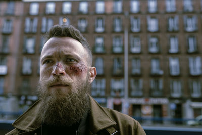 Portrait of man wearing mask outdoors