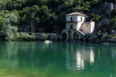 Scenic view of lake against trees