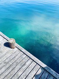 High angle view of pier by ocean