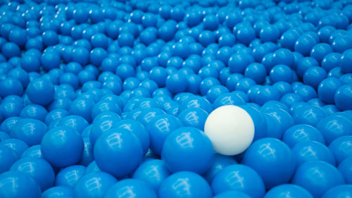 Blue plastic ball in the playgroud