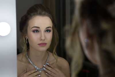 Close-up of young woman with eyes closed