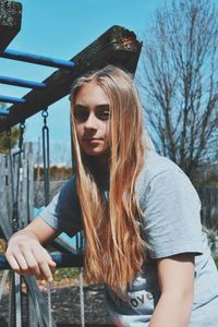 Young woman standing in playground