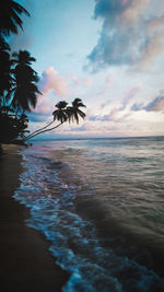 Scenic view of sea against sky at sunset