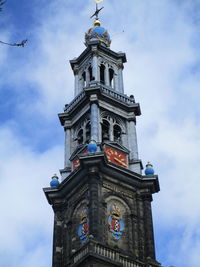 Low angle view of clock tower against sky