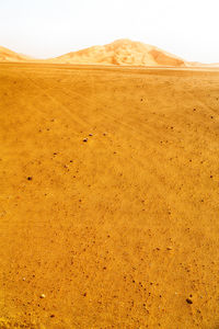 Scenic view of desert against sky