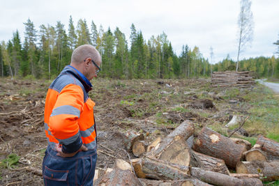 Man standing in forest