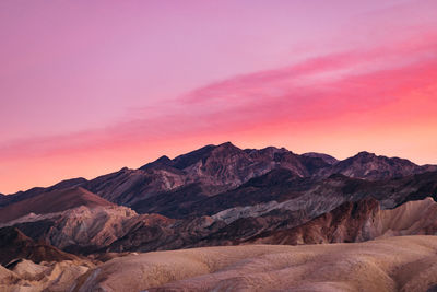 Scenic view of mountains against sky during sunset