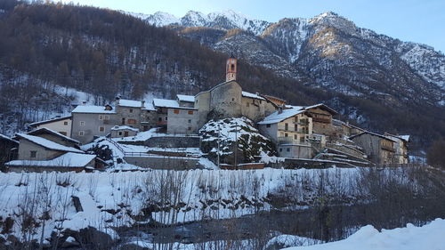 An incredibly enchanting medieval with a spectacular backdrop of the snow-capped mountains.