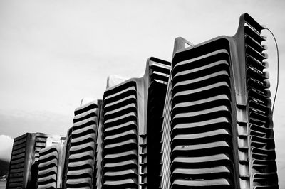 Low angle view of modern buildings against clear sky