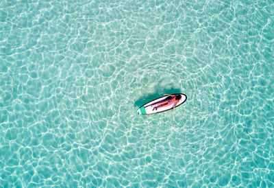 High angle view of swimming in pool