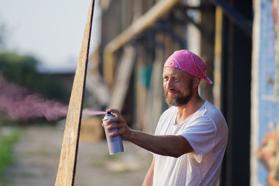 Young man looking away outdoors