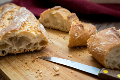 High angle view of bread on cutting board