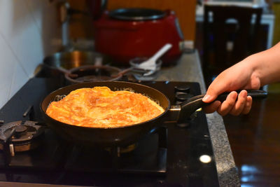 Man preparing food in kitchen