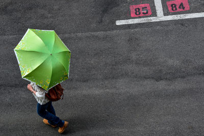 High angle view of person with umbrella