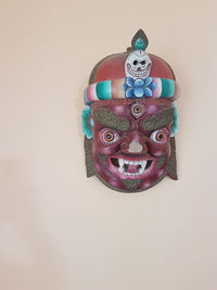 Close-up of mask against gray background