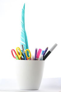 Close-up of colorful balloons on white background