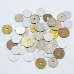 High angle view of coins