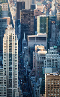 Looking down on the fifth avenue between the skyscrapers in the evening light