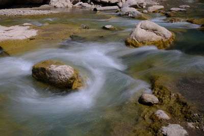 High angle view of rocks in sea