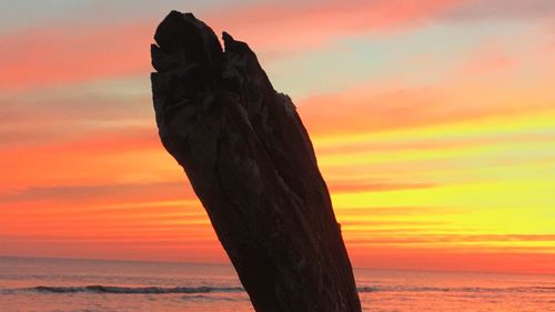 Scenic view of sea at sunset