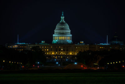 Illuminated building at night