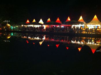 Reflection of illuminated buildings in water