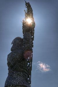 Low angle view of illuminated lights at night