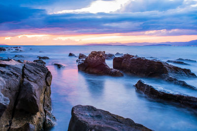 Scenic view of sea against sky during sunset