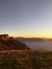 Scenic view of landscape against sky during sunset