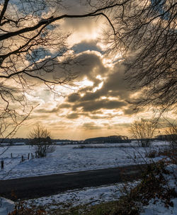 Scenic view of frozen sea against sky during winter