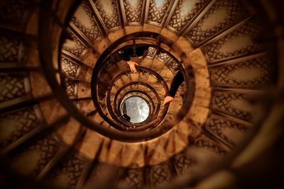 Directly below shot of spiral staircase in building