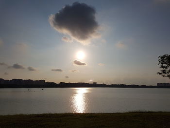 Scenic view of lake against sky during sunset