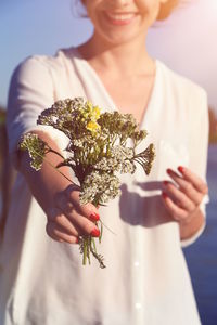 Woman holding flowers