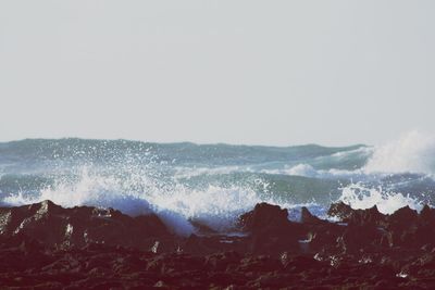 Scenic view of sea against clear sky