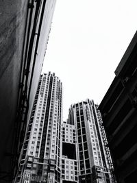 Low angle view of buildings against clear sky