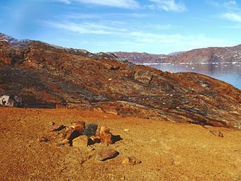 Scenic view of rocks against sky