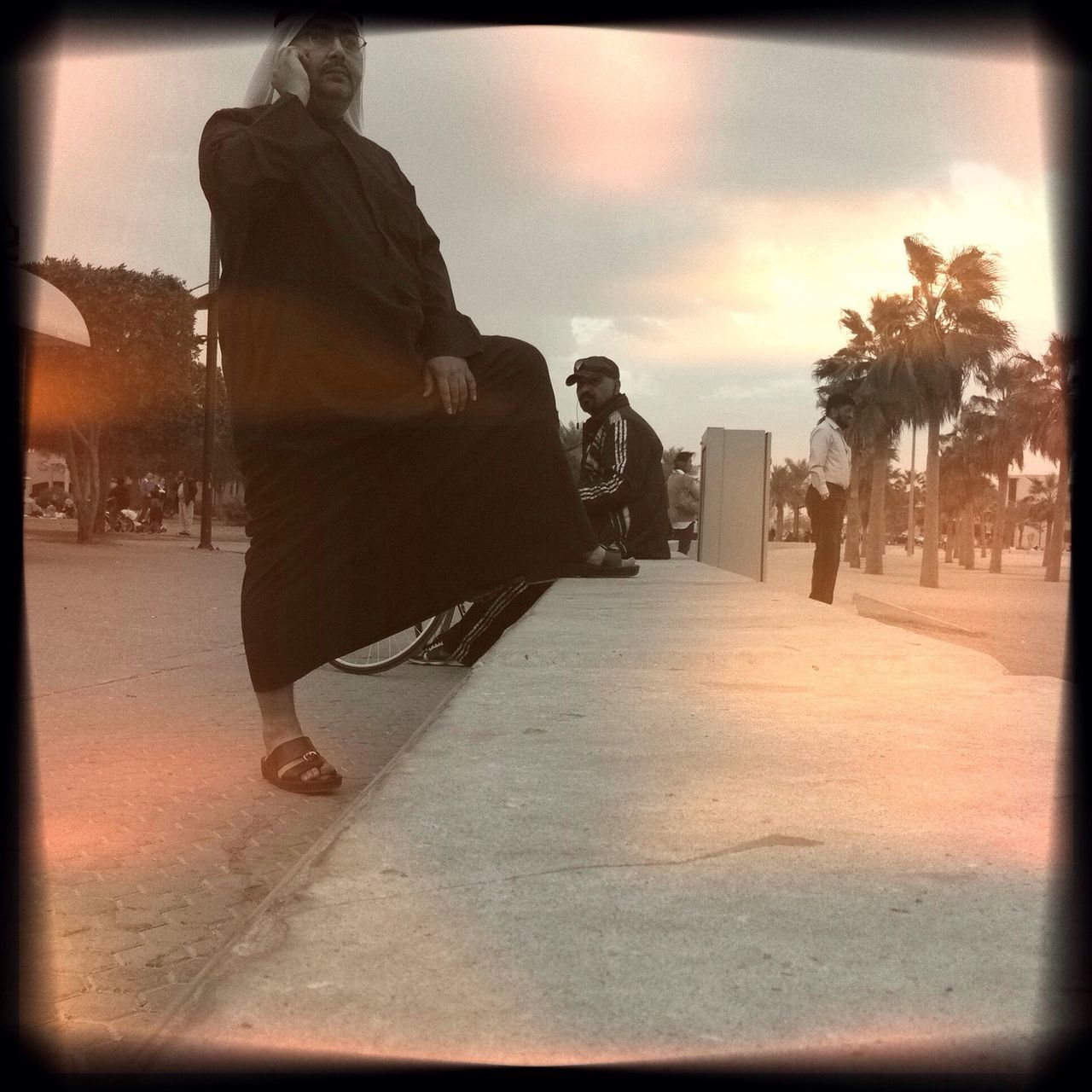 transfer print, auto post production filter, lifestyles, sky, men, leisure activity, rear view, full length, person, incidental people, street, walking, standing, sunset, outdoors, day, human representation