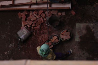 Directly above shot of man working at construction site